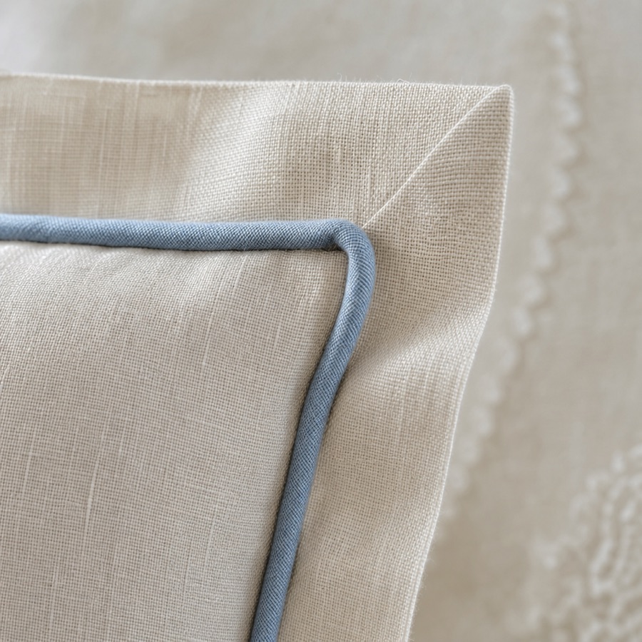 Close view of the piped welting running along the sham’s finished edge.