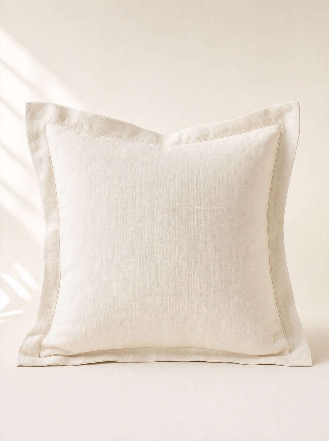 A blank ivory Cotton Couture sham, shown as the starting point for a made-to-order custom piece.